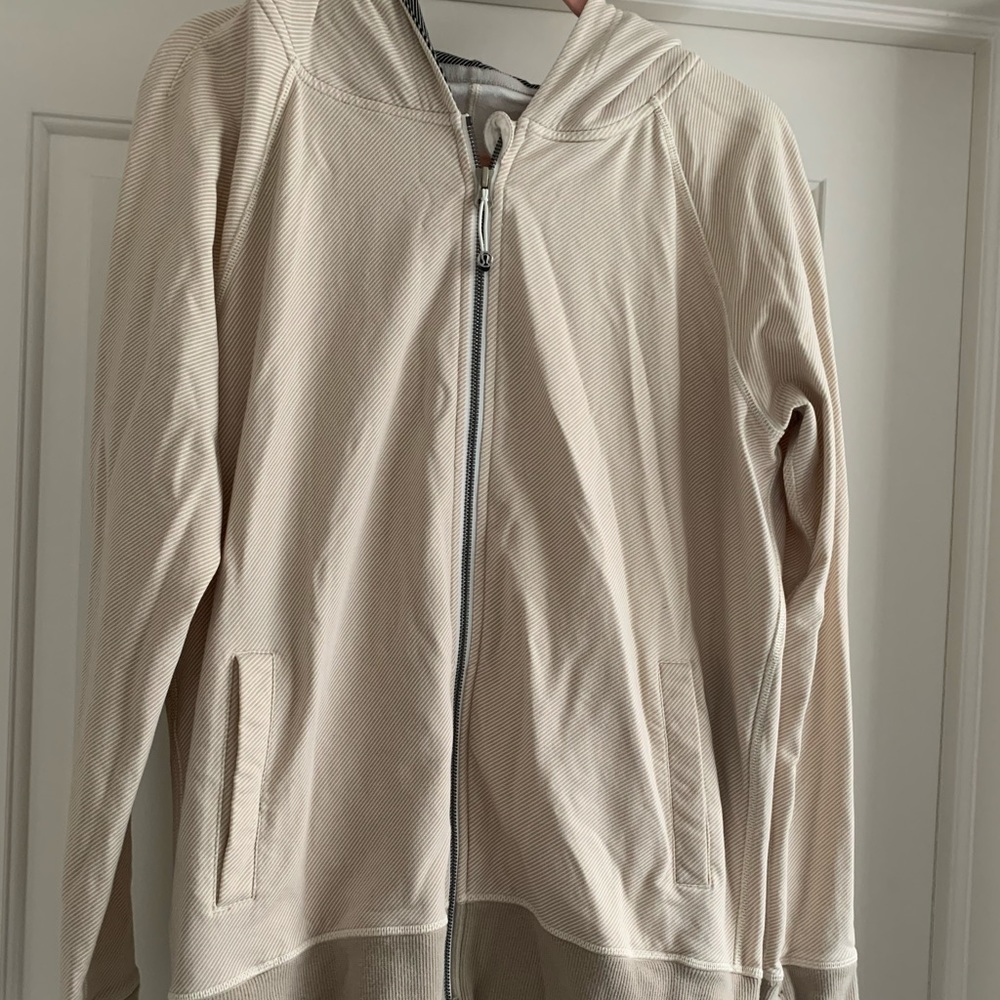 Lululemon zip up. Size 8 cream and tan.